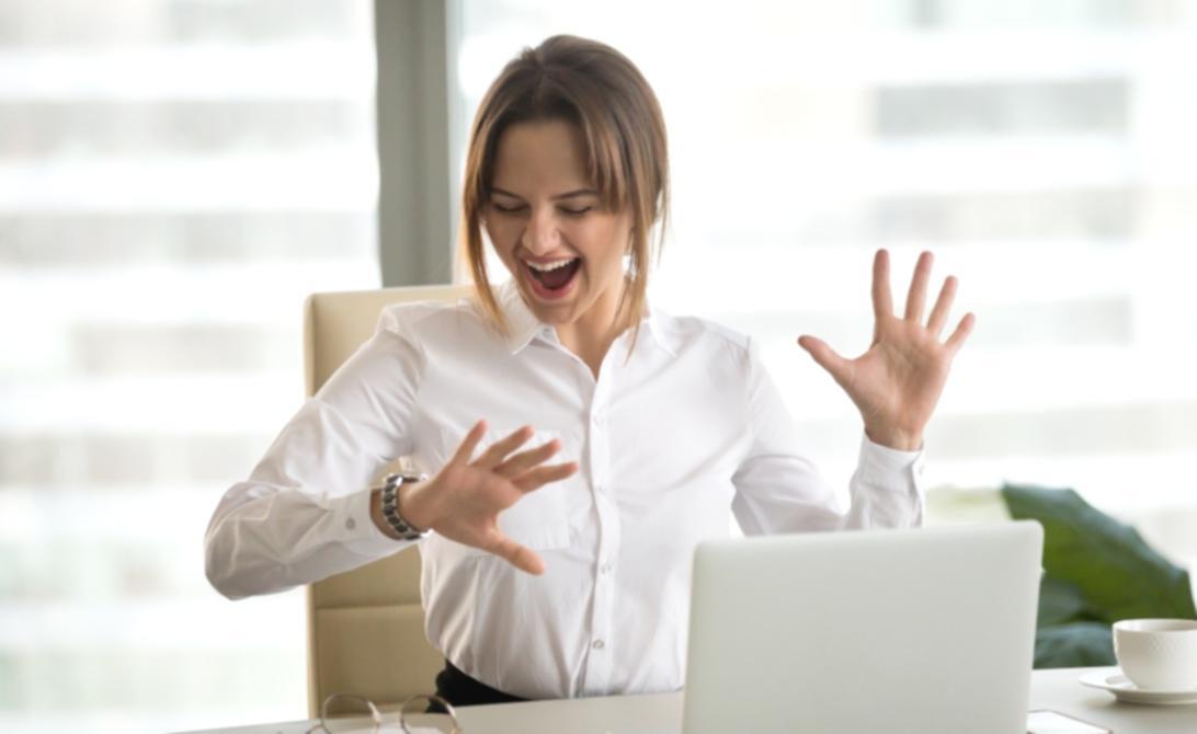 Student workspace setup showing laptop and learning materials